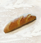detall d'un pa amb simbols del forn de pa altarriba